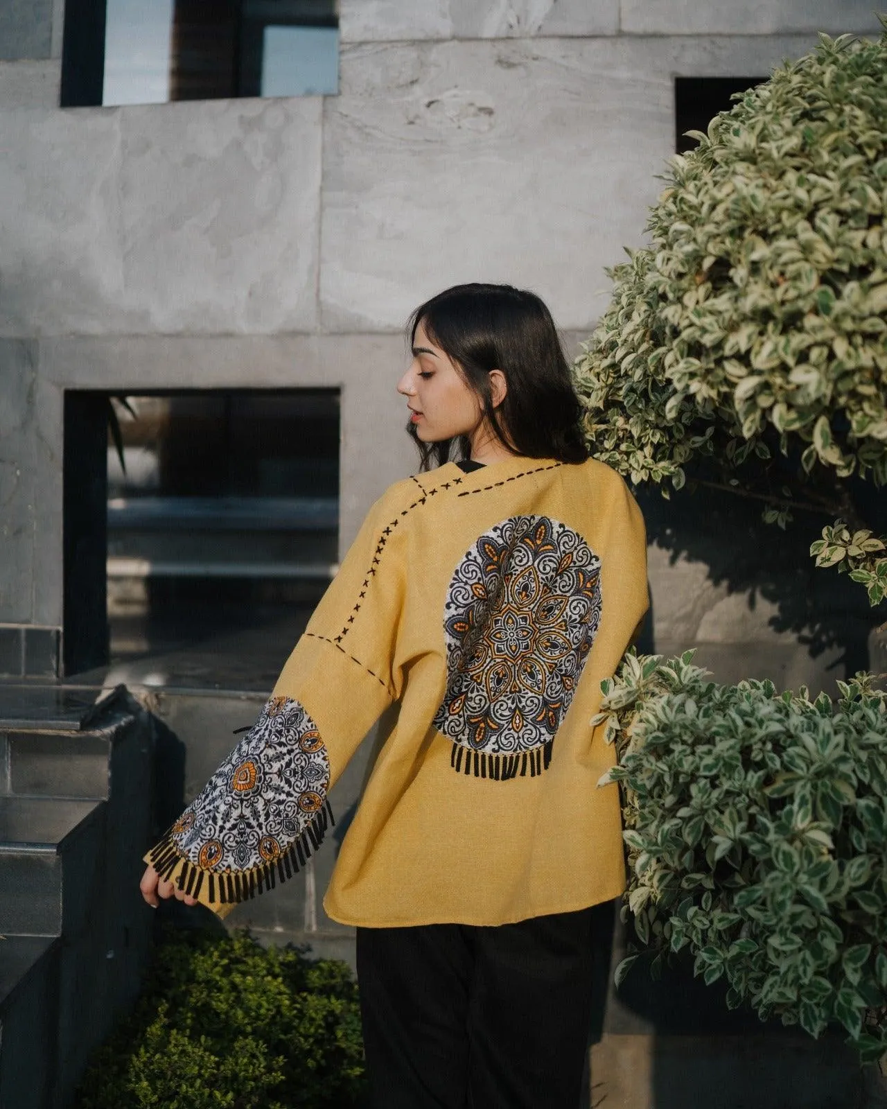 Yellow Handmade Cardigan with Unique Motifs and Tassels